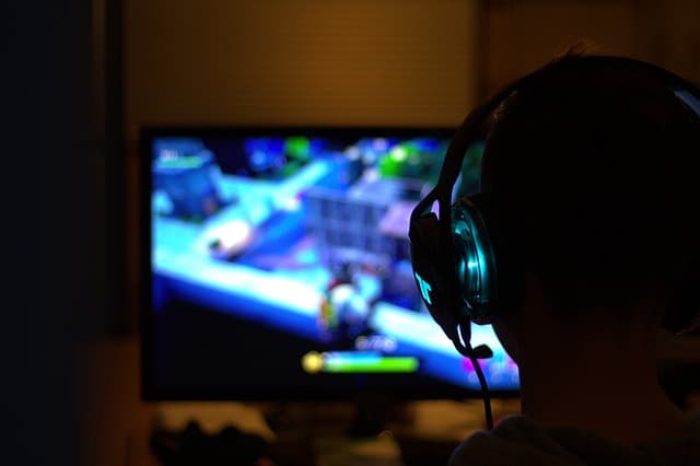 a boy playing a console